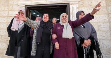 Relatives of Mahmud Abu Alheja, one of the two Palestinian youths killed in an Israeli army raid in Jenin, mourn in occupied West Bank, Palestine, March 13, 2024. (AFP Photo)