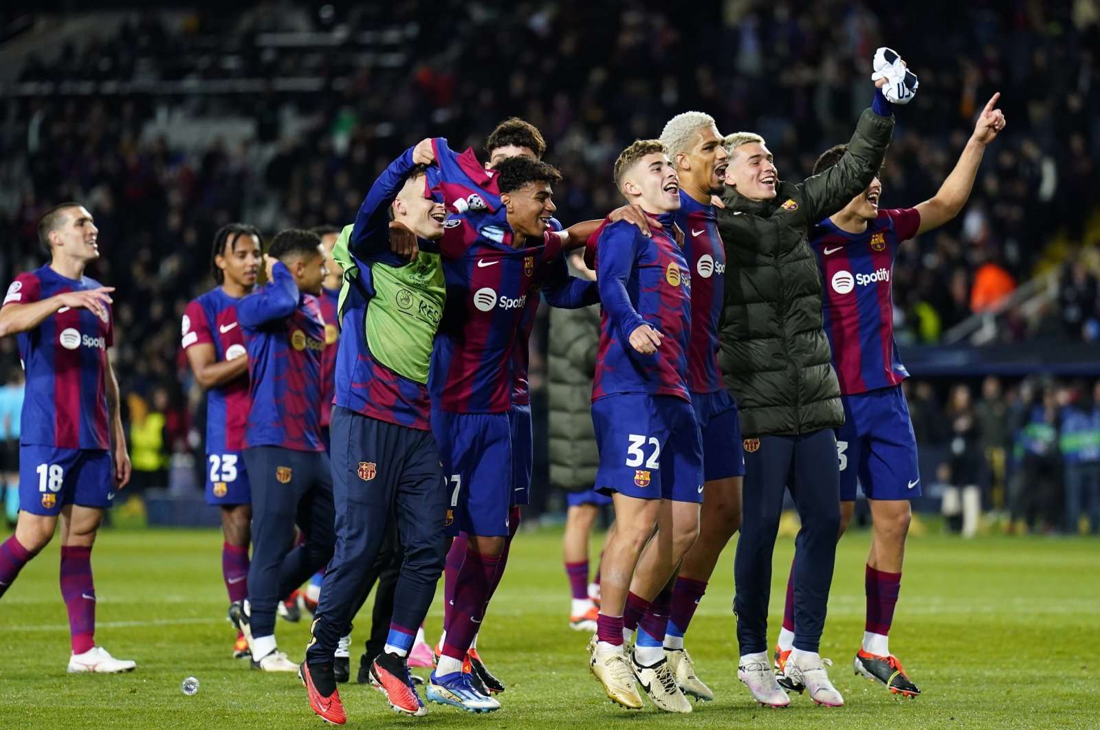FC Barcelona players celebrate winning the UEFA Champions League round of 16 second leg match against Napoli, Barcelona, Spain, March 12, 2024. (EPA Photo)