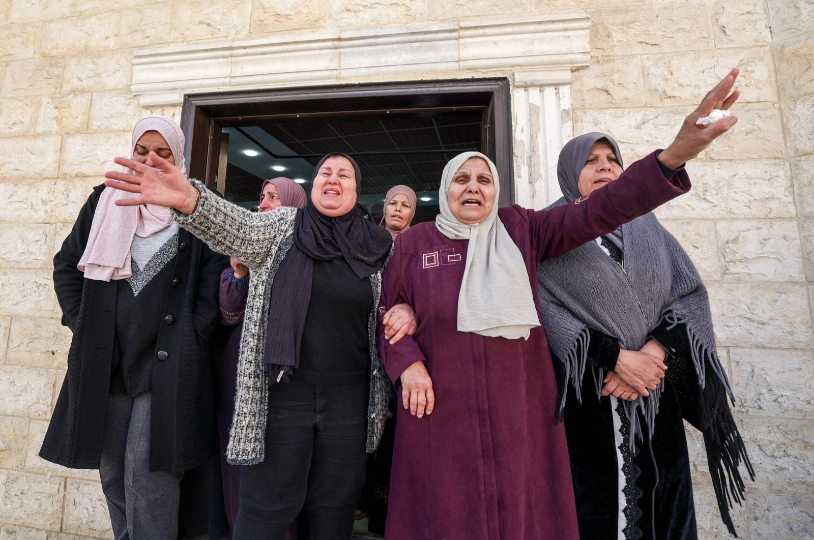 Relatives of Mahmud Abu Alheja, one of the two Palestinian youths killed in an Israeli army raid in Jenin, mourn in occupied West Bank, Palestine, March 13, 2024. (AFP Photo)