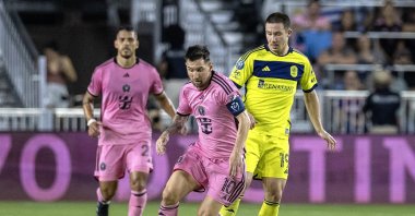Inter Miami Lionel Messi (C) in action against Nashville SC's Alex Muyl (R) during the CONCACAF Champions Cup match, Fort Lauderdale, Florida, U.S., March 13, 2024. (EPA Photo)