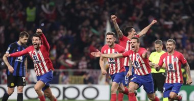 Atletico Madrid's players celebrate victory at the end of the UEFA Champions League last 16 second leg football match against Inter Milan at the Metropolitano stadium, Madrid, Spain, March 13, 2024. (AFP Photo)