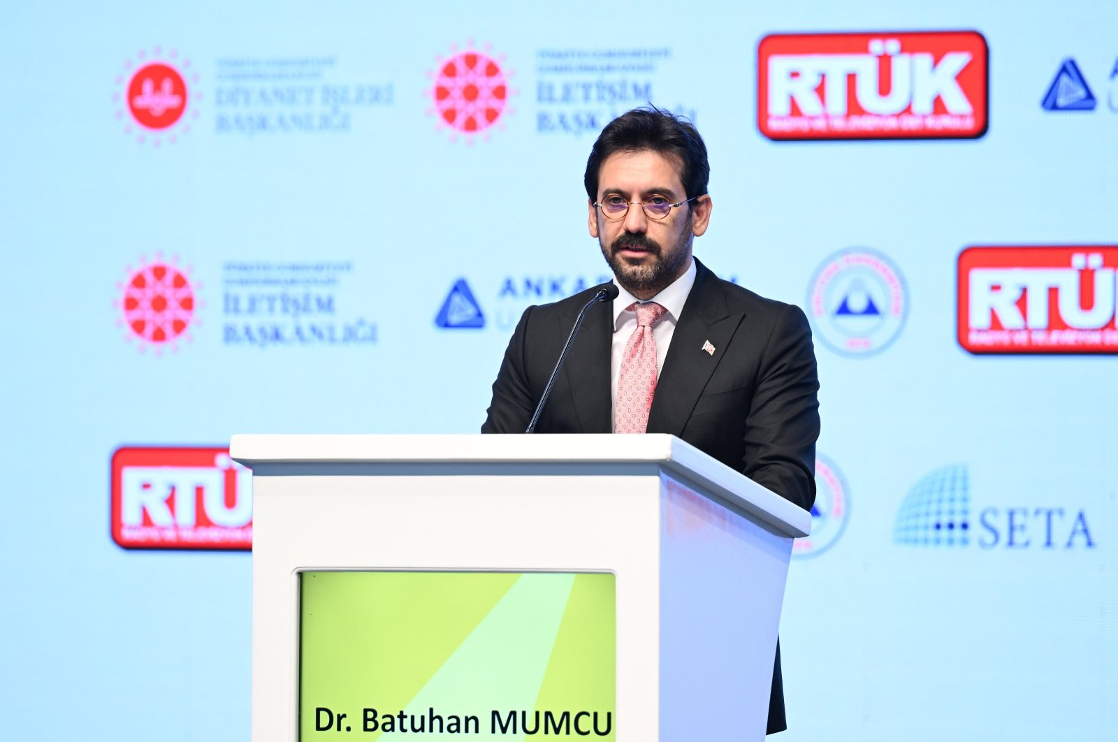 Dr. Batuhan Mumcu addresses the forum in the capital, Ankara, Türkiye, March 14, 2024. (AA Photo)