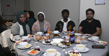 International students came together at the iftar program held in the YTB building, Ankara, Türkiye, March 15, 2024. (AA Photo)
