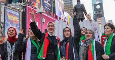 Türkiye&#039;s Women and Democracy Foundation (KADEM) commemorate Palestinian women who lost their lives in Israel&#039;s attacks on Gaza, Times Square, New York, U.S., March 14, 2024. (AA Photo)