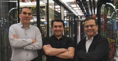 Sedat Yıldırım (L) and Köksal Yılmaz (C), co-founders of Topi Technology, and investor Ahmet Bilgen. (Courtesy of Topi)