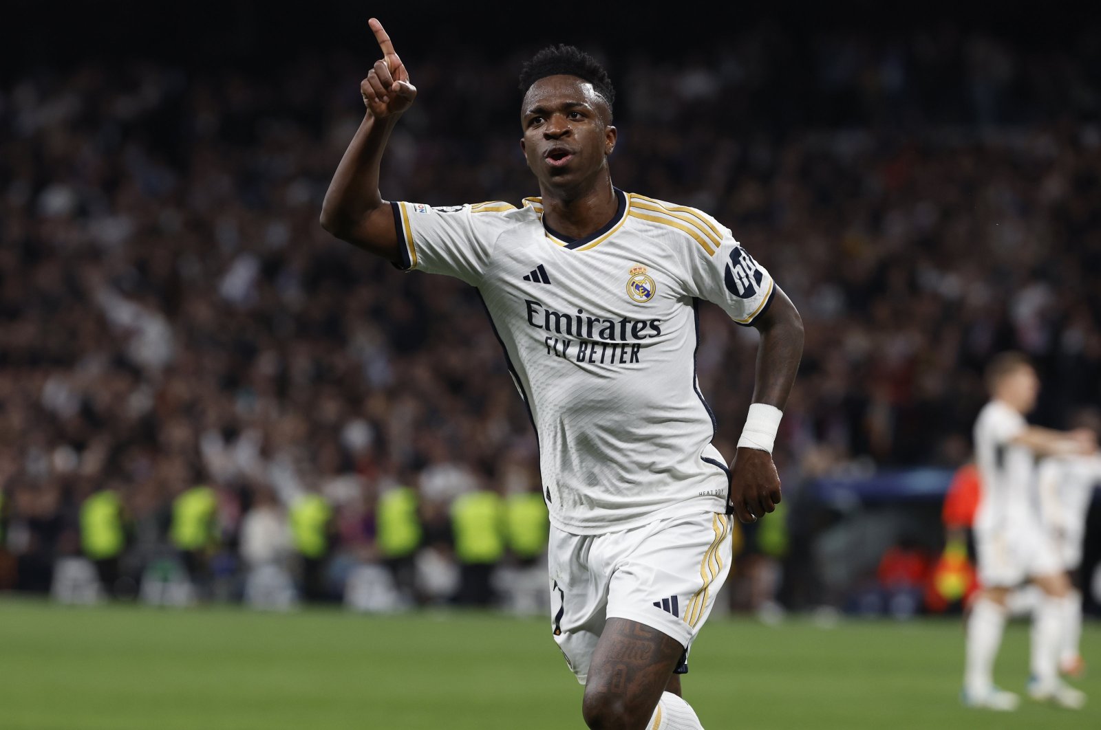 Real Madrid&#039;s Vinicius Junior celebrates after scoring the 1-0 goal during the UEFA Champions League round of 16 second leg match against RB Leipzig, Madrid, Spain, March 6, 2024. (EPA Photo)