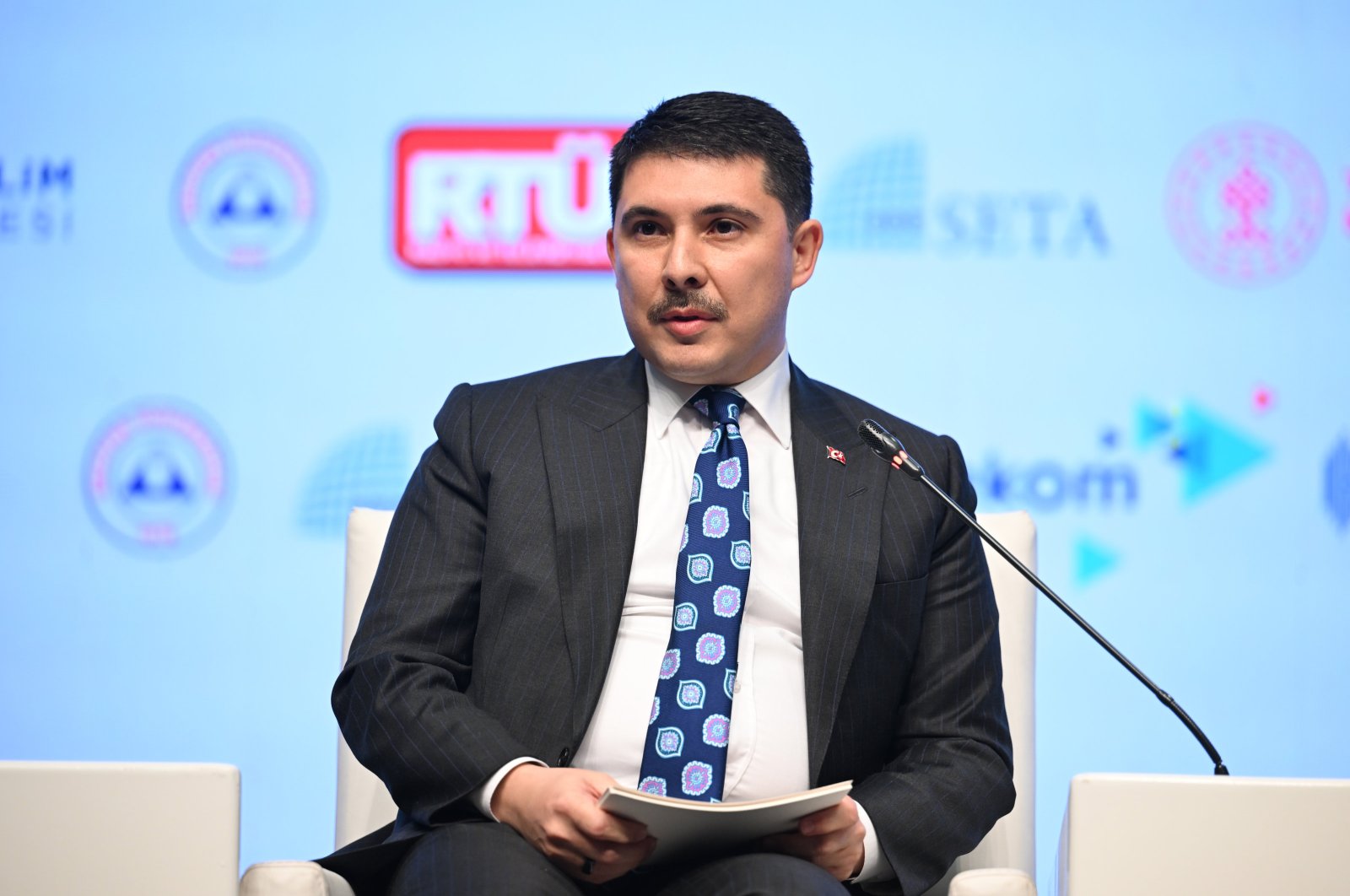 Ambassador Associate Professor Hasan Doğan speaks at the forum in the capital of Ankara, Türkiye, on March 14, 2024. (AA Photo)