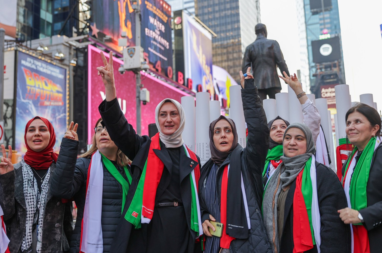 Türkiye&#039;s Women and Democracy Foundation (KADEM) commemorate Palestinian women who lost their lives in Israel&#039;s attacks on Gaza, Times Square, New York, U.S., March 14, 2024. (AA Photo)