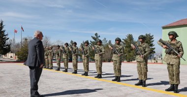 Defense Minister Yaşar Güler salutes the soldiers at a military base near the border with Iraq, Şırnak, southeastern Türkiye, March 13, 2024. (AA Photo)