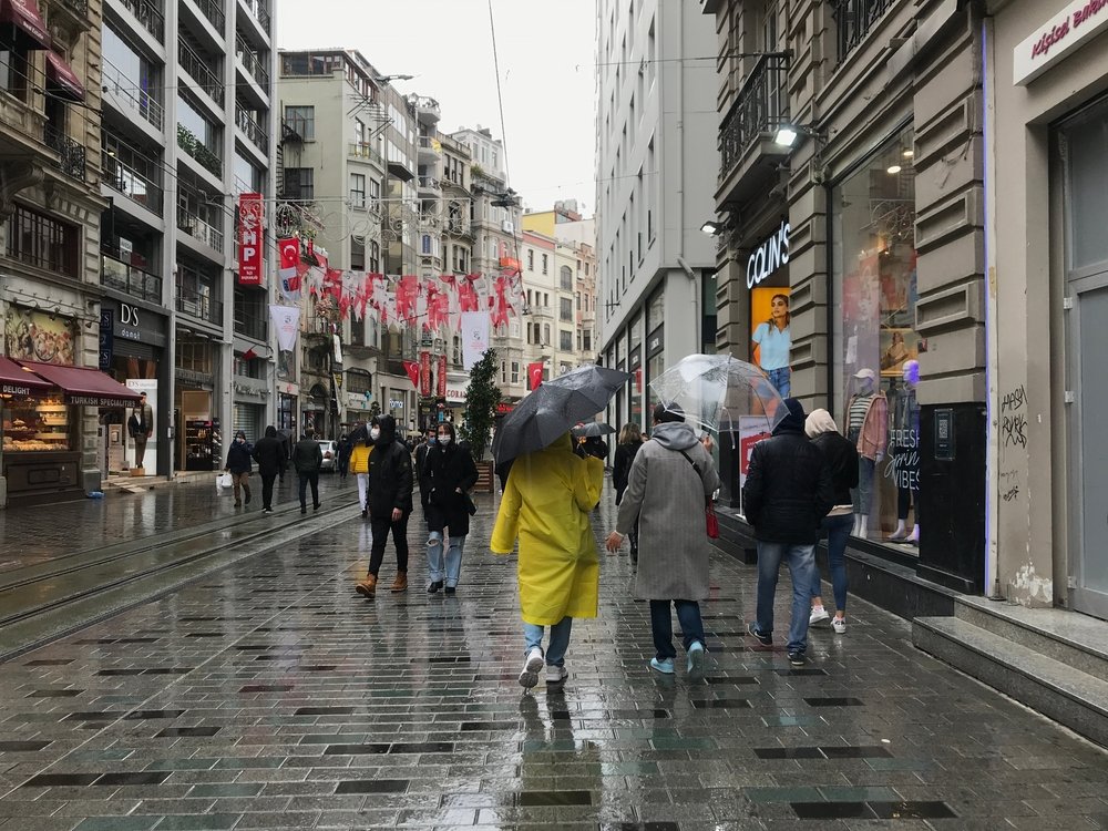 People walking on Istiklal Street in the rain, Taksim, Istanbul, Türkiye, April 5, 2024. (Shutterstock Photo)