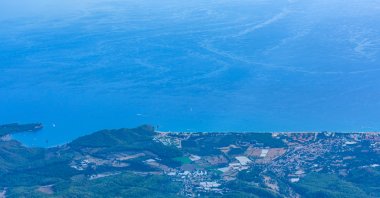 A view the Mediterranean sea and village from the summit of Tahtali mountain. (Shutterstock Photo)