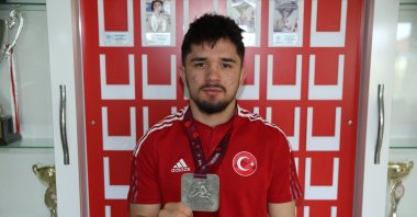 Turkish wrestler Muhammet Karavuş poses for a photo with his European Wrestling Championships silver medal, Ordu, Türkiye, March 18, 2024. (AA Photo)