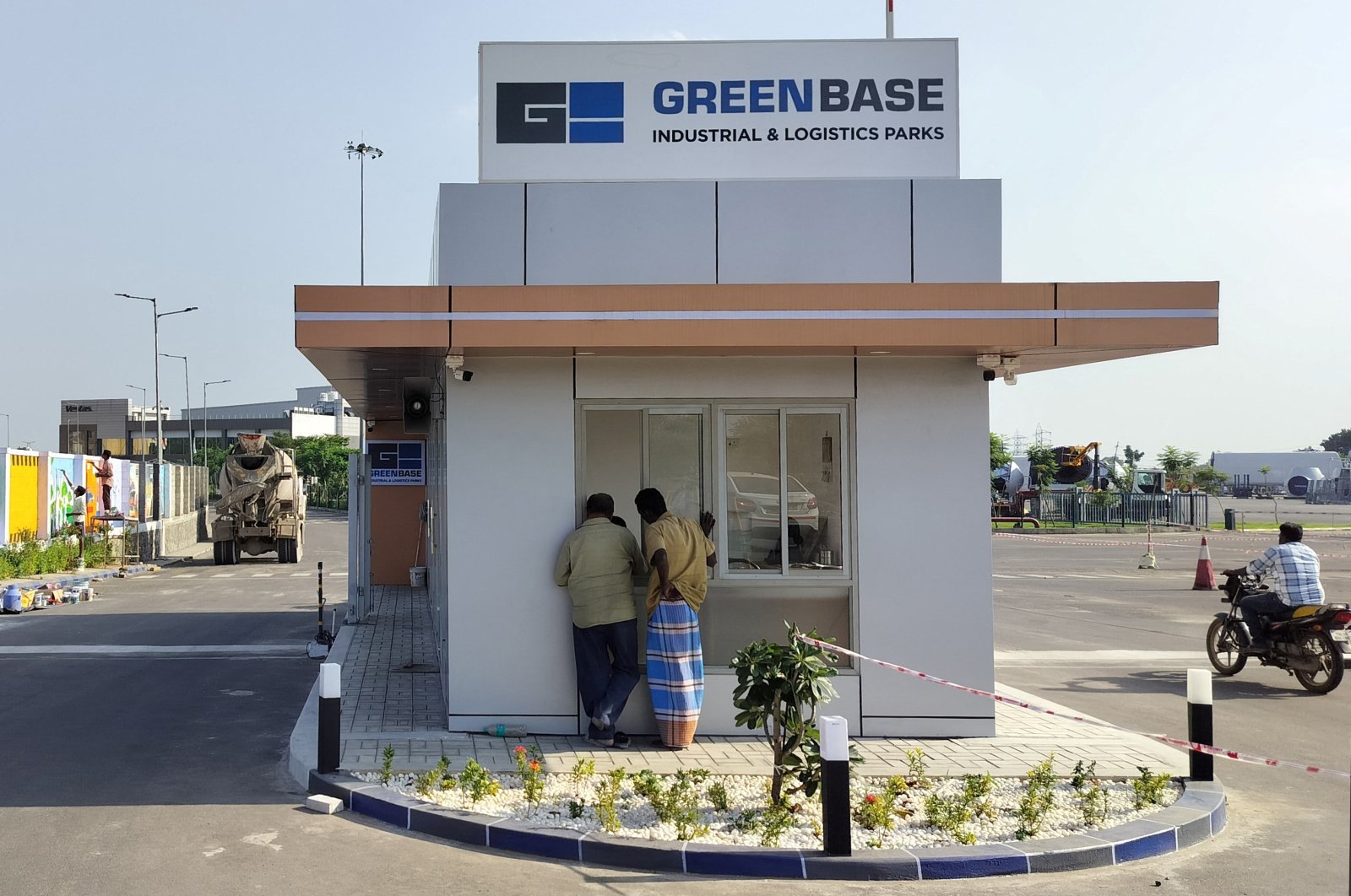 Visitors stand outside Greenbase Industrial &amp; Logistics Parks near Chennai, Tamil Nadu, India, Jan. 29, 2024. (Reuters Photo)