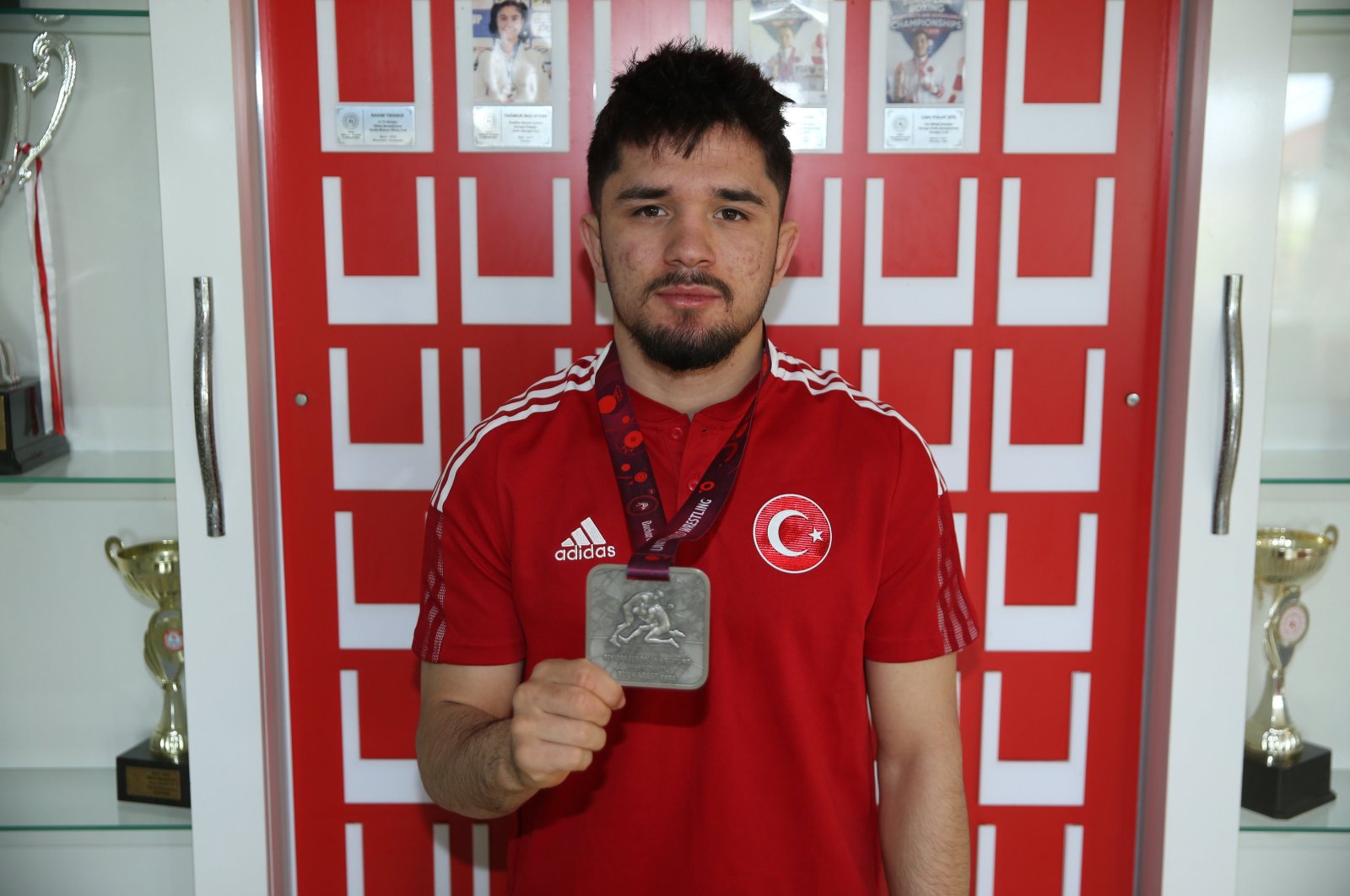 Turkish wrestler Muhammet Karavuş poses for a photo with his European Wrestling Championships silver medal, Ordu, Türkiye, March 18, 2024. (AA Photo)