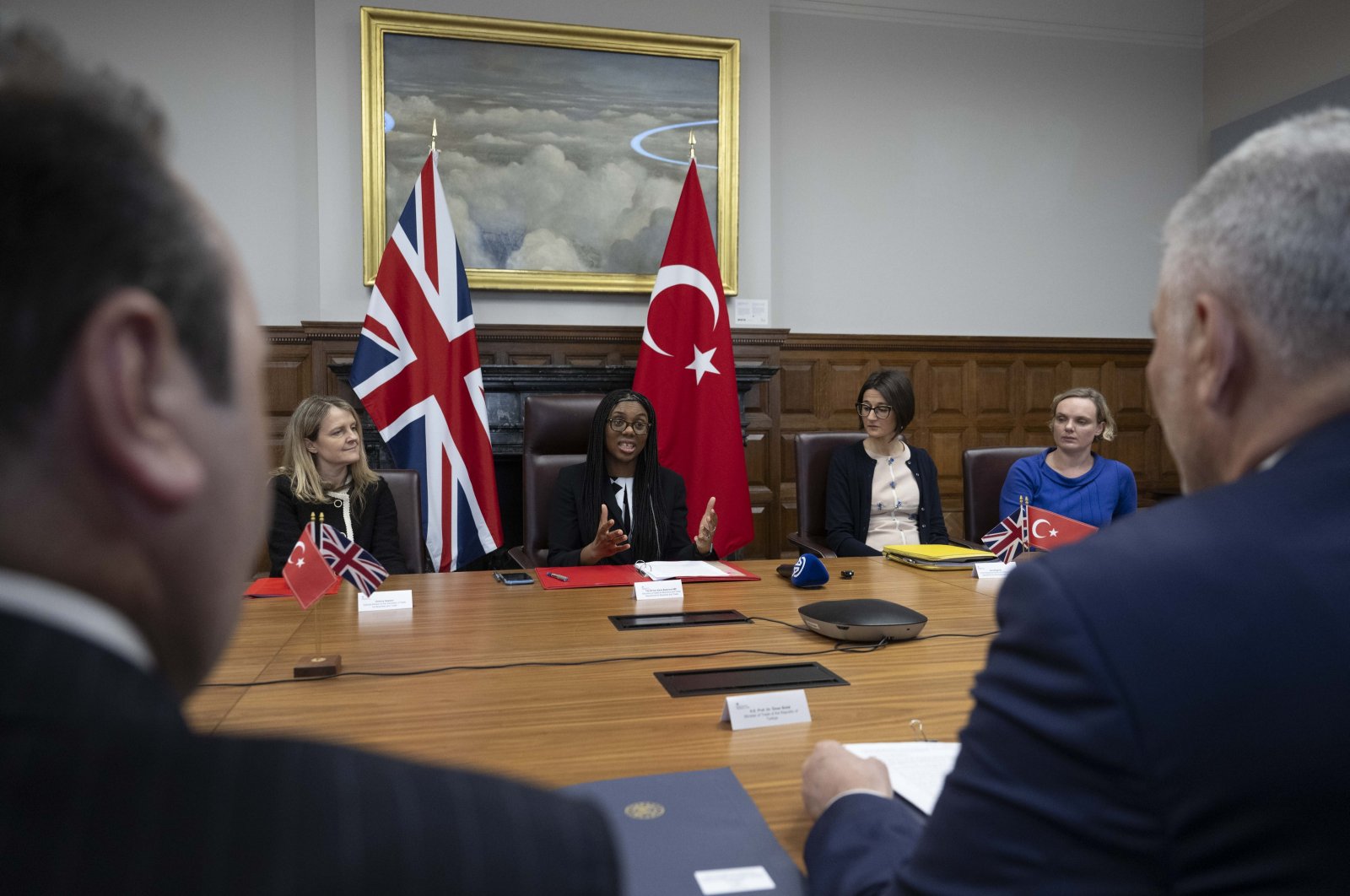 Türkiye and U.K. official delegations speak during a recent meeting on an update of the free trade agreement (FTA) between the countries, London, Britain, March 14, 2024. (AA Photo)