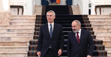 Armenian Prime Minister Nikol Pashinyan (R) and NATO Secretary-General Jens Stoltenberg arrive for a joint news conference in Yerevan, Armenia, March 19, 2024. (AFP Photo)