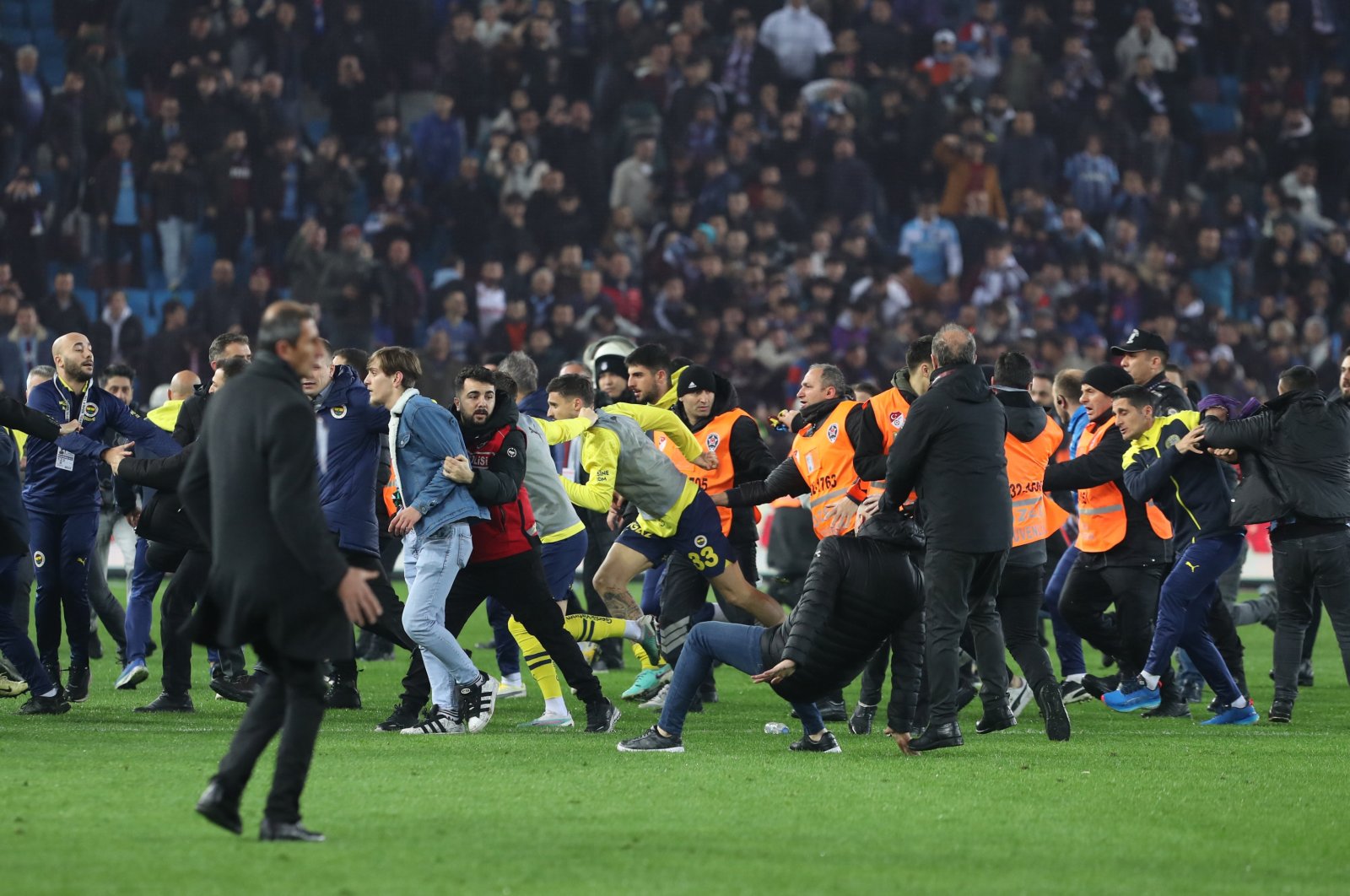 Trabzonspor fans attack Fenerbahçe players after the Süper Lig match, Trabzon, Türkiye, March 17, 2024. (EPA Photo)