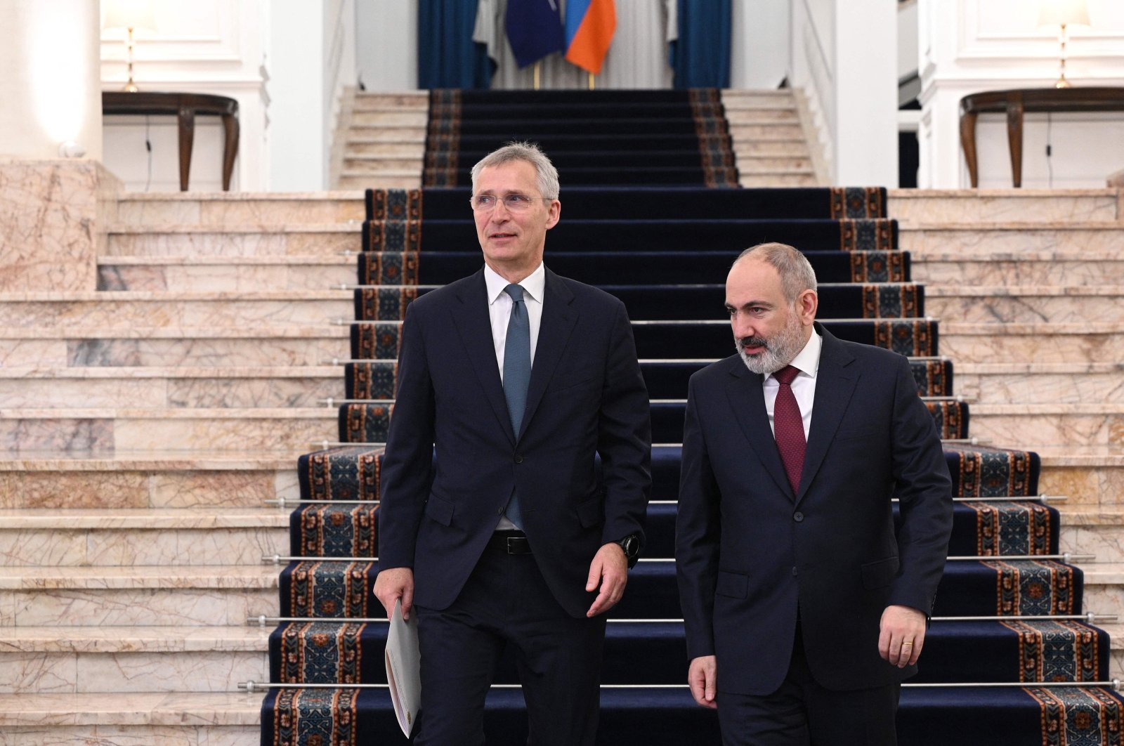 Armenian Prime Minister Nikol Pashinyan (R) and NATO Secretary-General Jens Stoltenberg arrive for a joint news conference in Yerevan, Armenia, March 19, 2024. (AFP Photo)