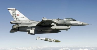 This handout photo from the Defense Ministry shows a Turkish military jet dropping a missile on PKK targets in the Metina and Gara regions of northern Iraq, Jan. 14, 2024. (AA Photo)