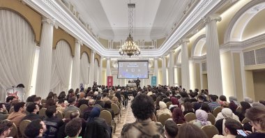 Daily Sabah Editor-in-Chief İbrahim Altay gives a presentation at the event in Warsaw, Poland, March 16, 2024. (Daily Sabah Photo)