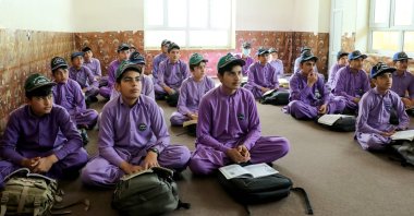 Afghan schoolboys attend their first class following the start of the new academic year, Khost, Afghanistan, March 20, 2024. (AFP Photo)