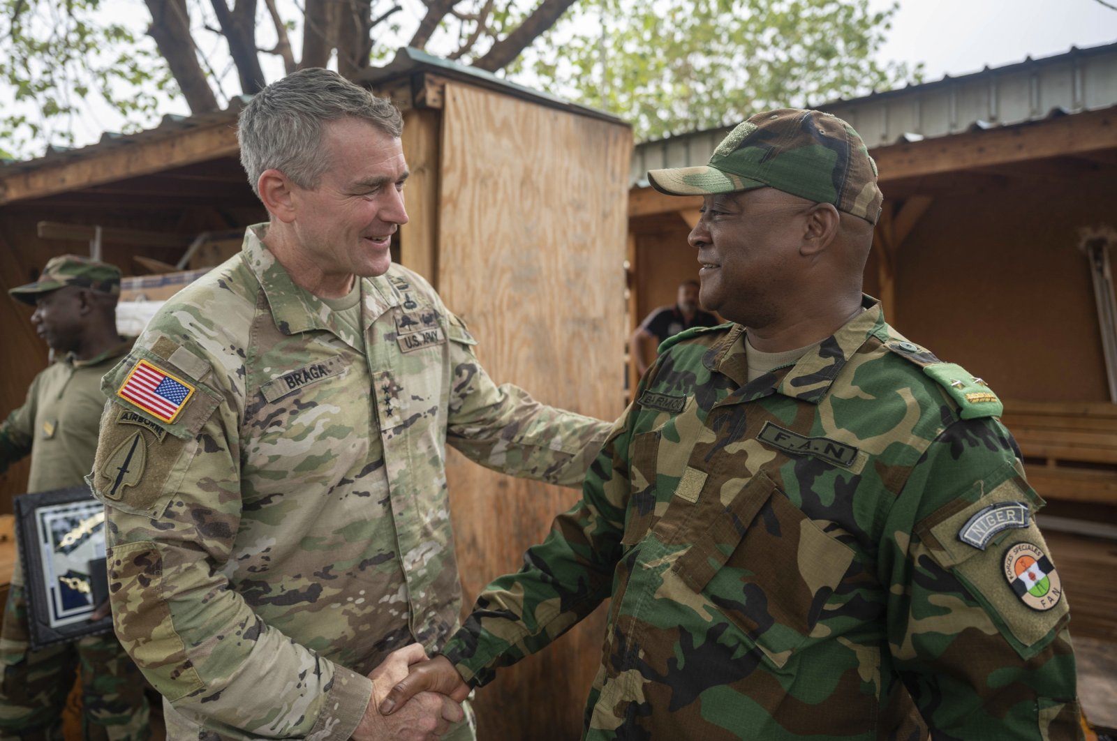 U.S. Army Lt. Gen. Jonathan Braga (L) meets with Maj. Gen. Moussa Barmou, Niger&#039;s Special Operations Forces commander, to discuss counterterrorism policies and tactics throughout Niger, at Air Base 101, Niger, June 12, 2023. (AP Photo)