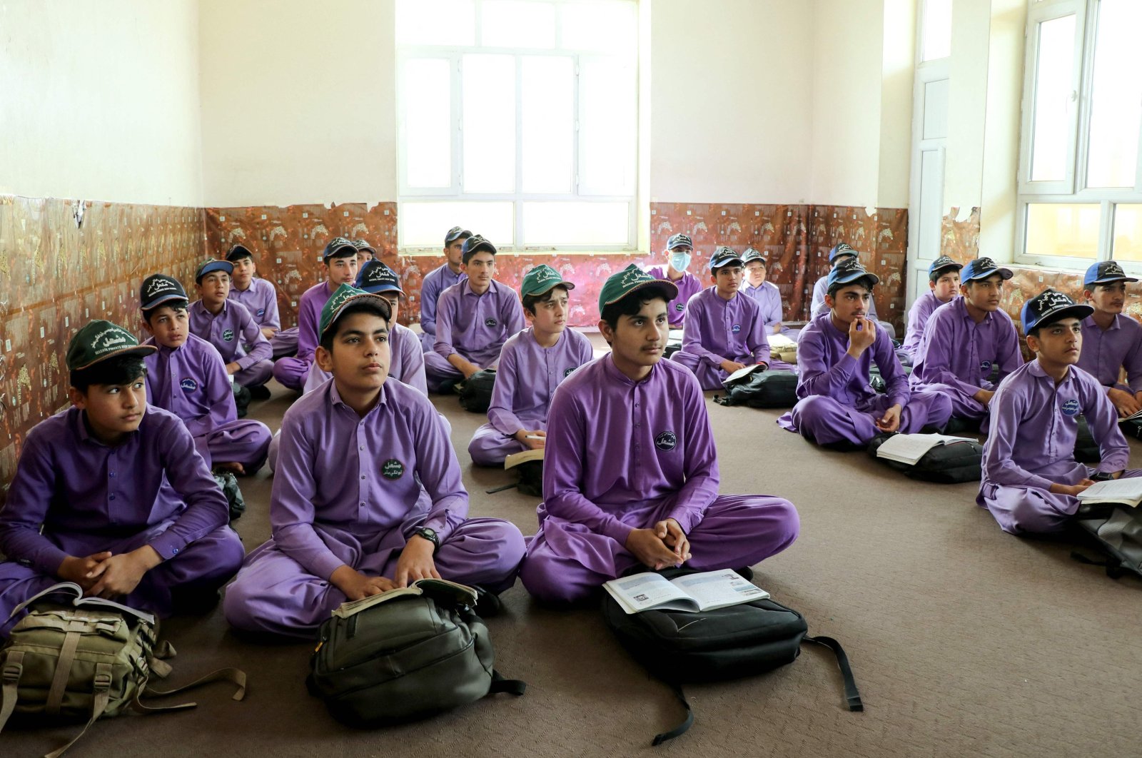 Afghan schoolboys attend their first class following the start of the new academic year, Khost, Afghanistan, March 20, 2024. (AFP Photo)