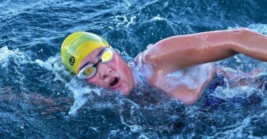 Turkish swimmer Aysu Türkoğlu in action while crossing the Cook Strait, New Zealand, March 20, 2024. (IHA Photo)