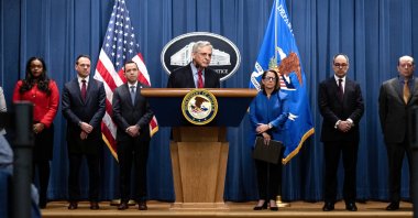 U.S. Attorney General Merrick Garland (C) speaks during a news conference announcing an antitrust case against Apple, at the Justice Department in Washington, D.C., U.S., March 21, 2024. (EPA Photo)