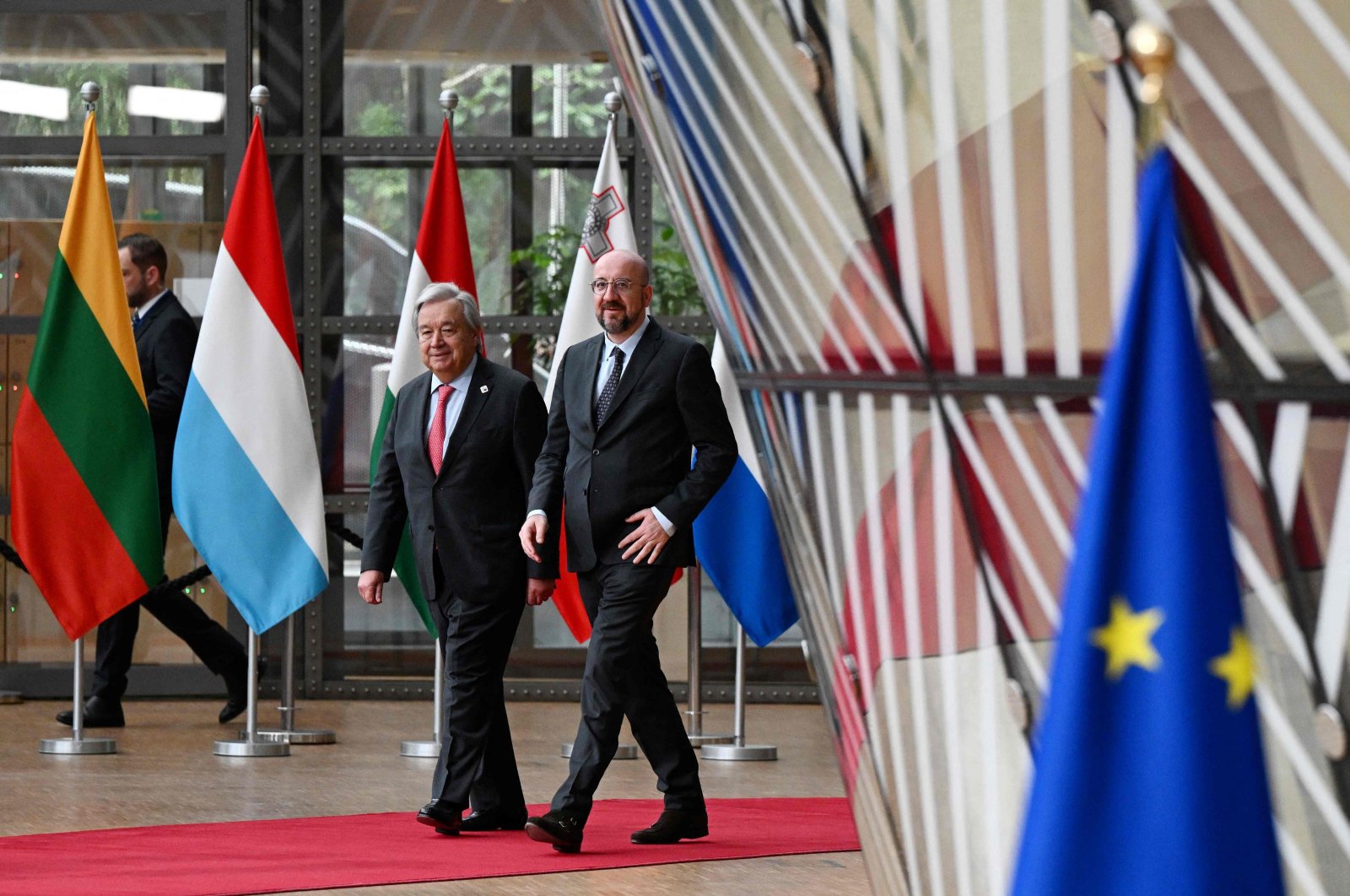European Council President Charles Michel (R) and U.N. Secretary-General Antonio Guterres arrive to attend a European Council summit, EU headquarters, Brussels, Belgium, March 21, 2024. (AFP Photo)