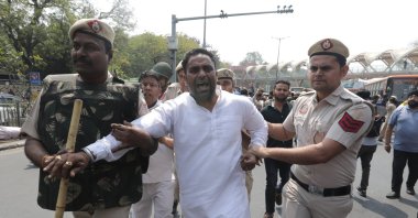 Indian security personnel detain a member of the Aam Aadmi Party (AAP) during a protest against Delhi Chief Minister Arvind Kejriwal&#039;s arrest, near Bharatiya Janta Party headquarters, New Delhi, India, March 22, 2024. (EPA Photo)