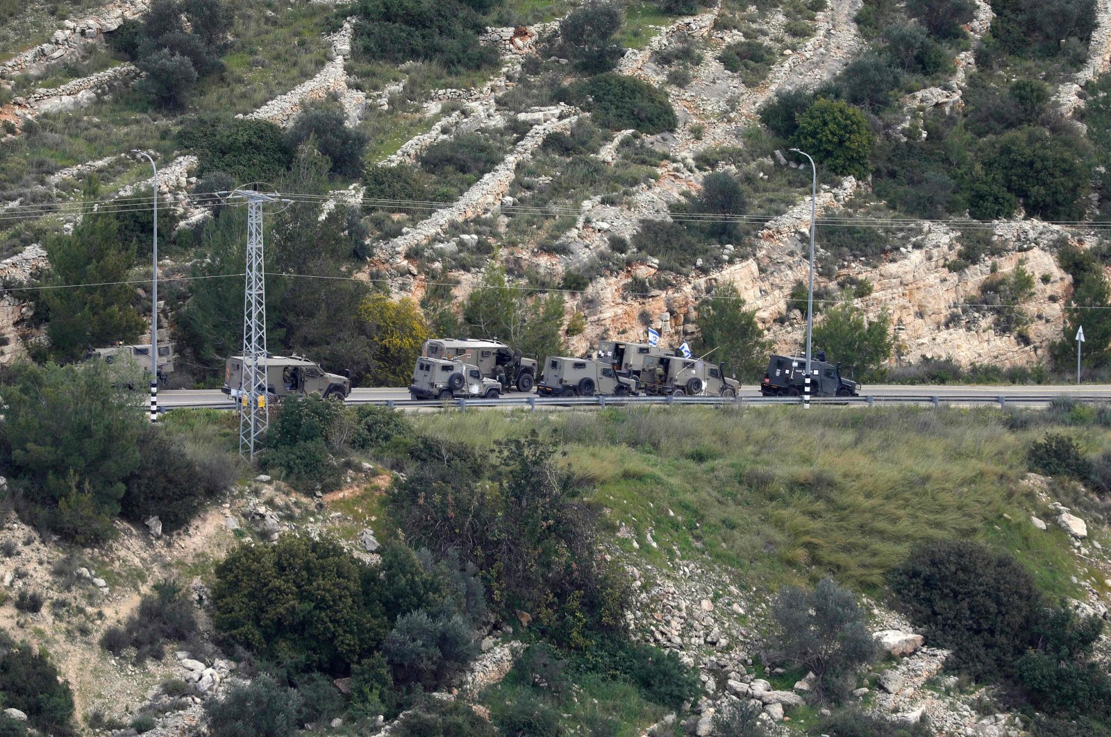 Israeli forces gather near the settlement of Dolev and the Palestinian city of Ramallah, West Bank, Palestine, March 22, 2024. (AFP Photo)