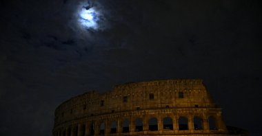 Lights at the Colosseum are switched off for the Earth Hour environmental campaign in Rome, Italy, March 23, 2024. (EPA Photo)