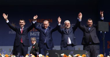 President Recep Tayyip Erdoğan (L-2) greets the crowd with Murat Kurum (L) at the ruling Justice and Development Party's (AK Party) rally in Istanbul, Türkiye, March 24, 2024. (AA Photo)