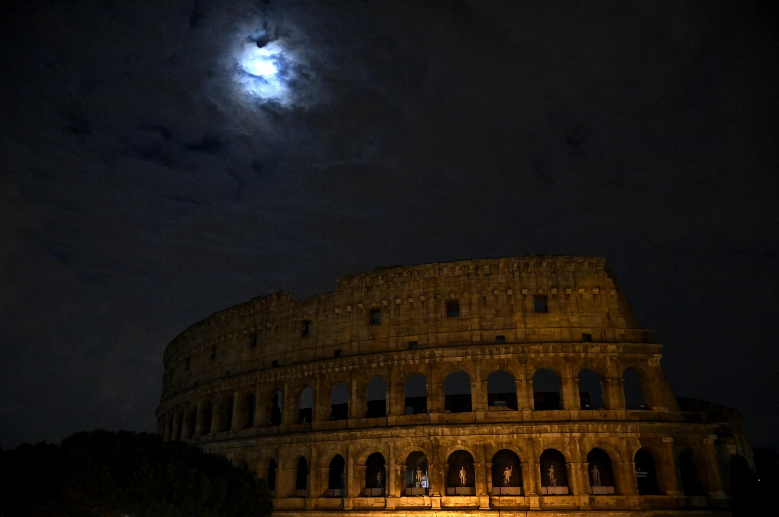 Lights at the Colosseum are switched off for the Earth Hour environmental campaign in Rome, Italy, March 23, 2024. (EPA Photo)