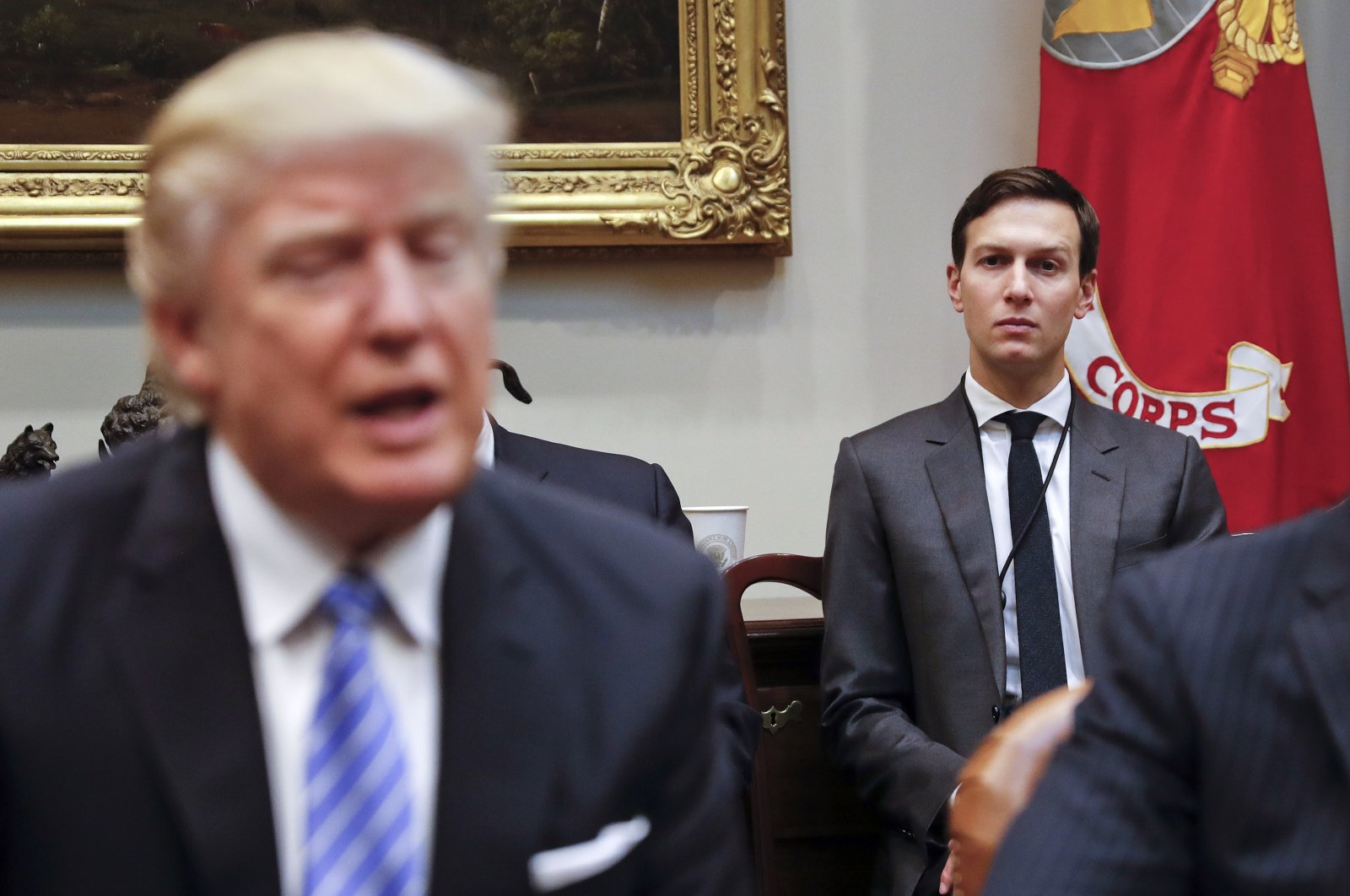Former White House Senior Adviser Jared Kushner (R) listens at right as then-President Donald Trump speaks during a breakfast with business leaders in the Roosevelt Room of the White House in Washington, U.S., Jan. 23, 2017. (AP File Photo))