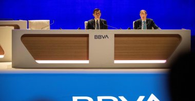 Spain's Banco Bilbao Vizcaya Argentaria (BBVA) Chair Carlos Torres (L) and General Secretary Domingo Armengol attend the bank's general shareholders' meeting, Bilbao, Spain, March 15, 2024. (AFP Photo)