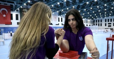 Turkish arm wrestler Azra Sarı (R) trains for the World Arm Wrestling Championships, Samsun, Türkiye, March 25, 2024. (AA Photo)