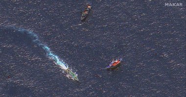 This satellite image shows Chinese and Philippine ships in contested waters of the South China Sea, March 24, 2024. (AFP Photo)
