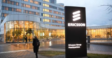 A woman walks past the Ericsson headquarters in Stockholm, Sweden, Jan. 24, 2020. (AFP Photo)