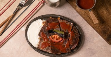 Iskender kebab served with yogurt. (Shutterstock Photo)