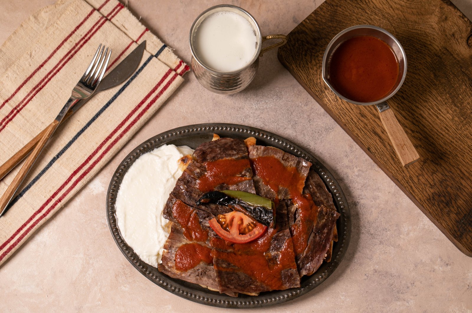 Iskender kebab served with yogurt. (Shutterstock Photo)