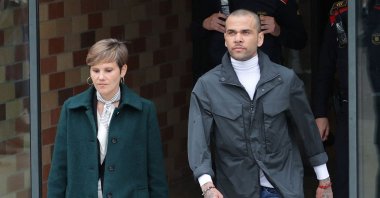 Former Brazil international football player Dani Alves (R) leaves on provisional release, flanked by his lawyer Ines Guardiola, Brians 2 Prison, Barcelona, Spain, March 25, 2024. (AFP Photo)