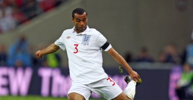 England's Ashley Cole kicks the ball during the World Cup group 6 qualifying match against Ukraine, Wembley Stadium, London, U.K., April 1, 2009. (AP Photo)