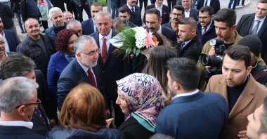 Labor and Social Security Minister Vedat Işıkhan (C-L) speaks to the public during a visit to Kırşehir, central Türkiye, March 25, 2024. (IHA Photo)