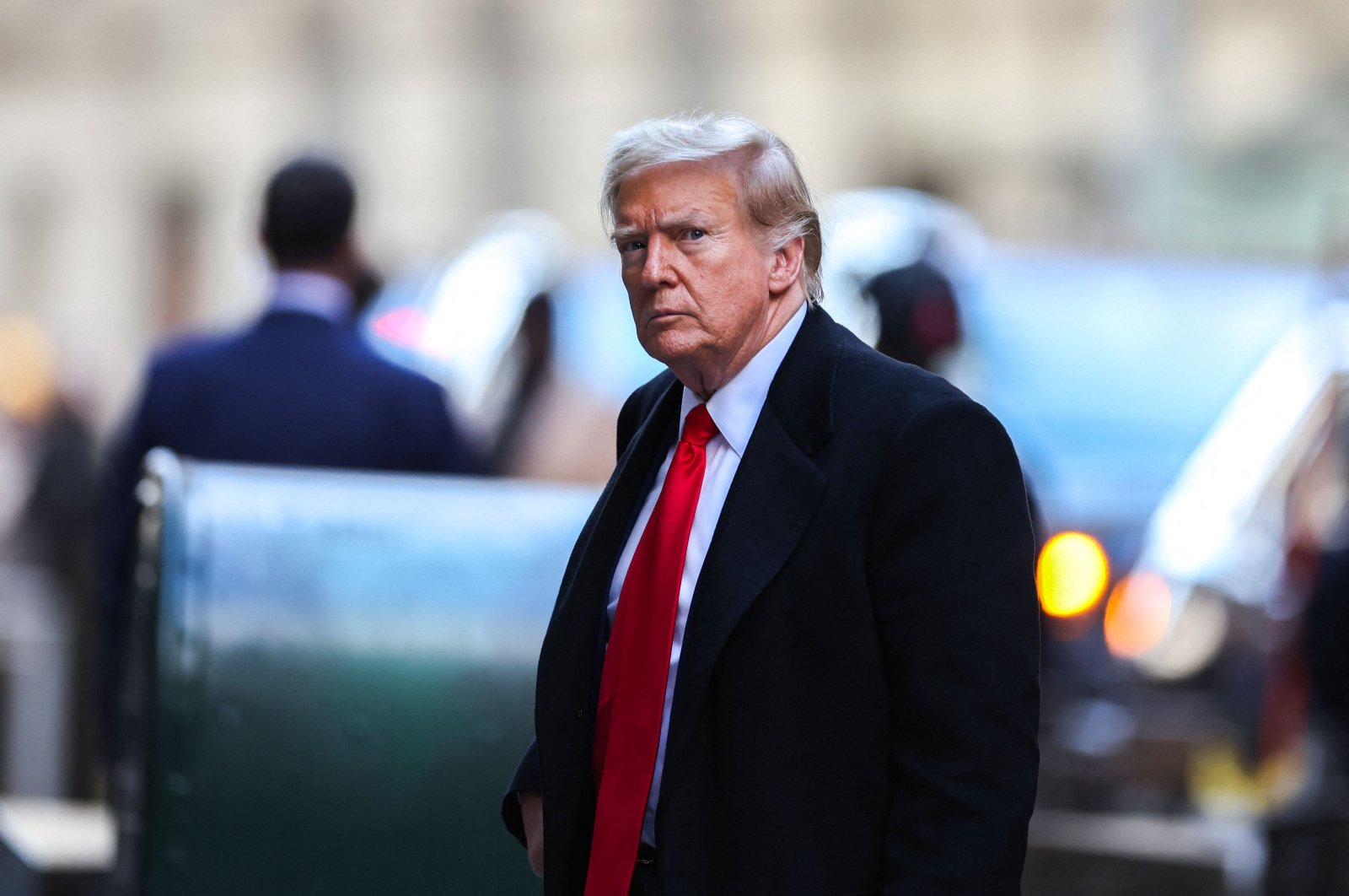 Former U.S. President Donald Trump arrives at 40 Wall Street after his court hearing to determine the date of his trial for allegedly covering up hush money payments linked to extramarital affairs, New York City, U.S., March 25, 2024. (AFP Photo)