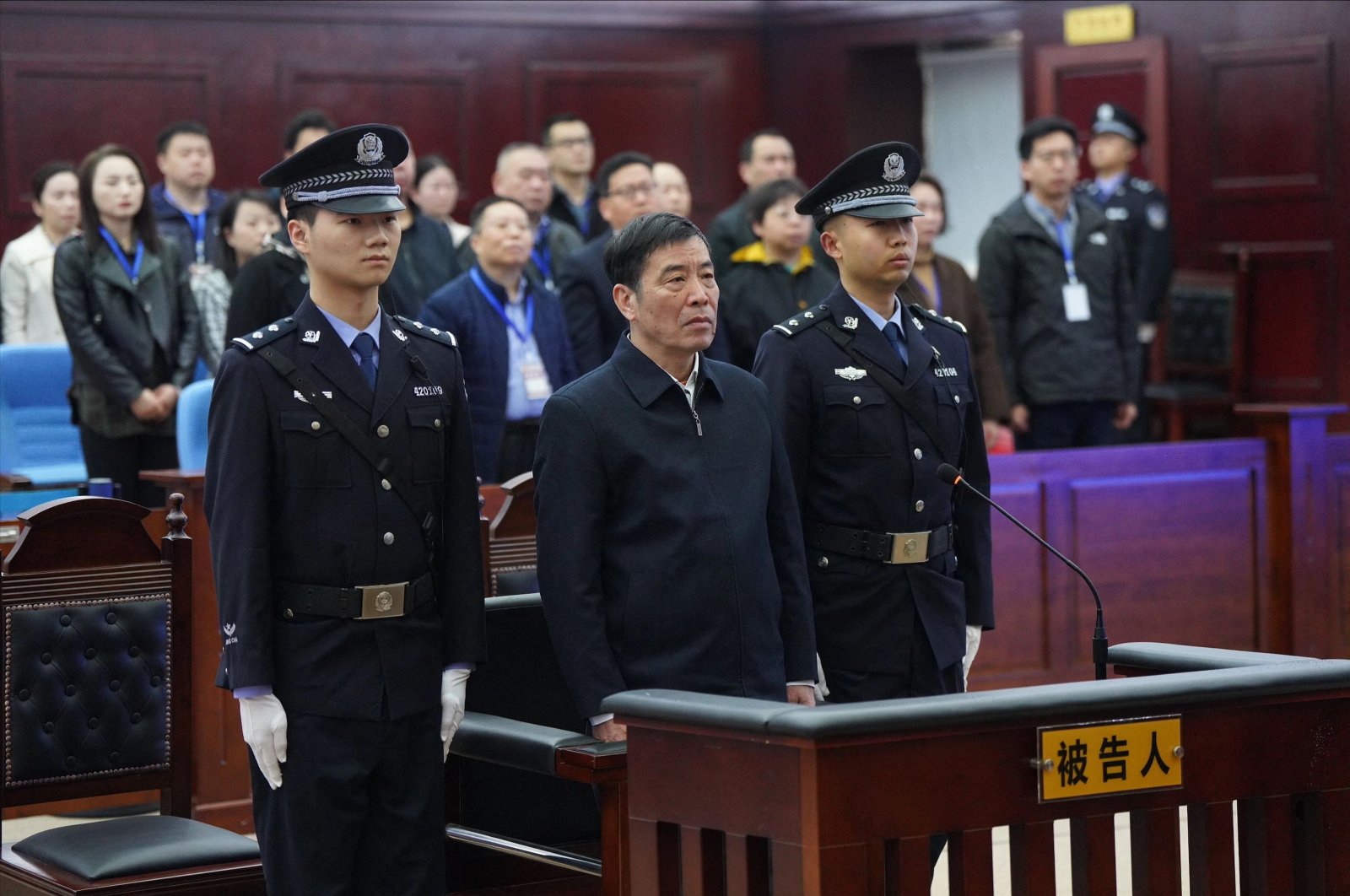 Chen Xuyuan (C), former chairman of Chinese Football Association, standing during his trial at the Huangshi Intermediate People’s Court, Huangshi, Hubei, China, March 26, 2024. (AFP Photo)
