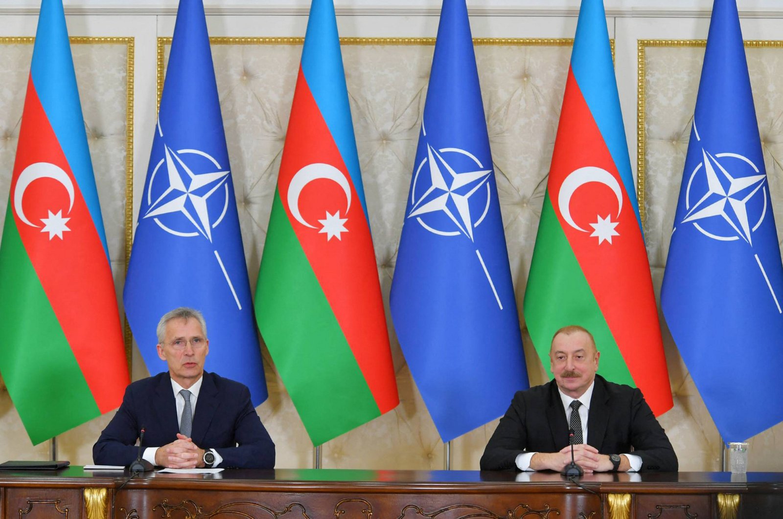 Azerbaijani President Ilham Aliyev (R) and NATO Secretary-General Jens Stoltenberg deliver press statements following their talks in Baku, Azerbaijan, March 17, 2024. (AFP Photo)