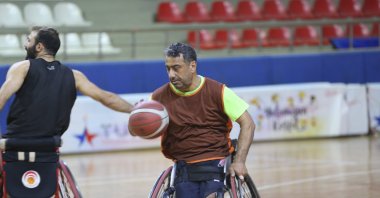 Turkish veteran wheelchair basketball player Fevzi Çakmak trains at the Tosyalı Iskenderun Disabled Sports Club, Hatay, Türkiye, March 27, 2024. (AA Photo)