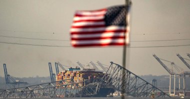 Part of the steel frame of the Francis Scott Key Bridge sits on top of the container ship Dali after the bridge collapsed in Baltimore, Maryland, March 26, 2024. (AFP Photo)